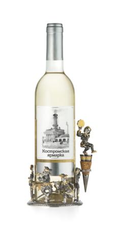 СЕРЕБРЯНАЯ ПОДСТАВКА ПОД БУТЫЛКУ "СКОМОРОХИ" – АЛЬТМАСТЕР