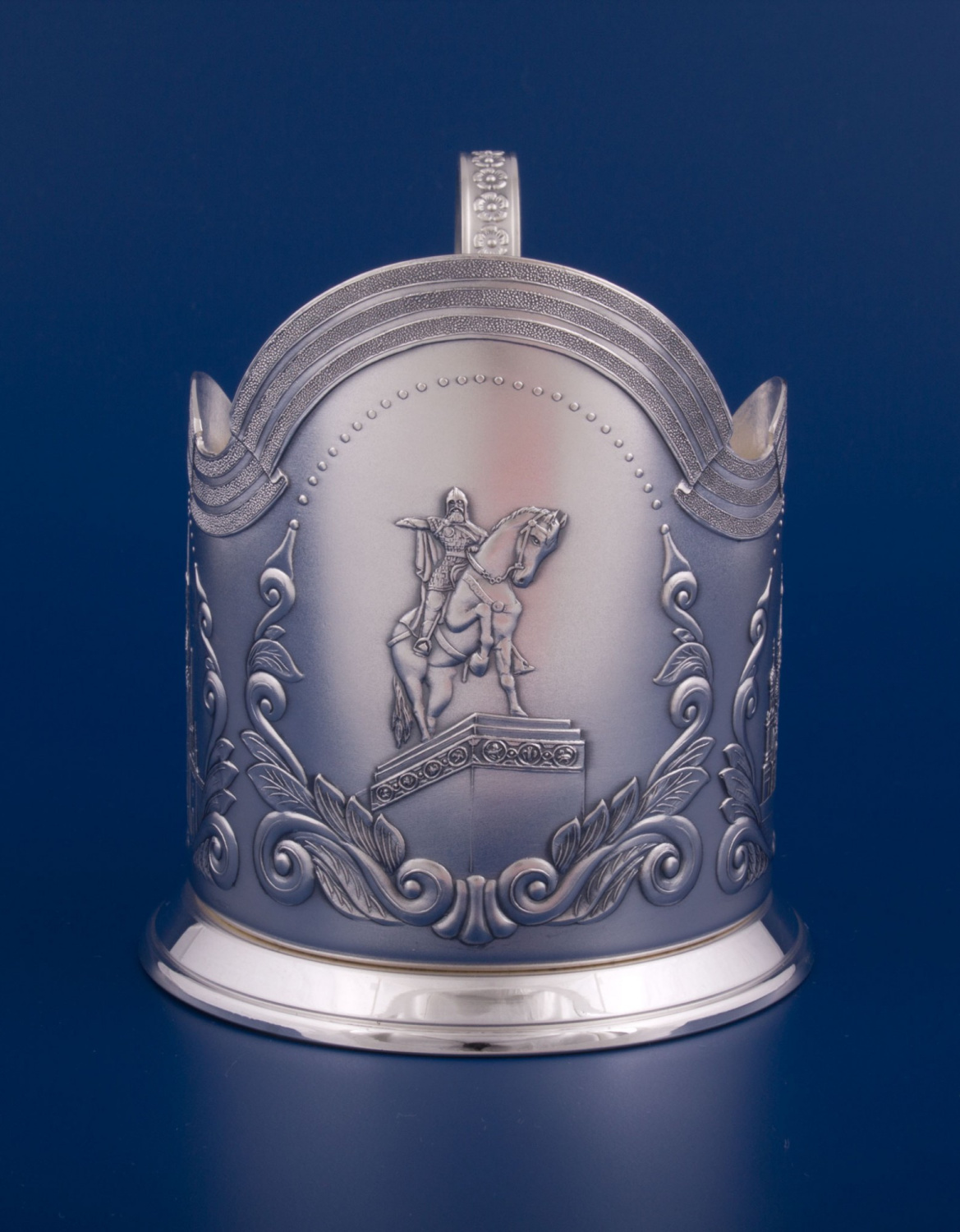 СЕРЕБРЯНЫЙ ПОДСТАКАННИК "СТОЛИЦА" – МСТЁРСКИЙ ЮВЕЛИР